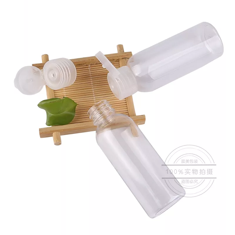 Tapa dispensadora con tapa abatible para botellas de cosméticos