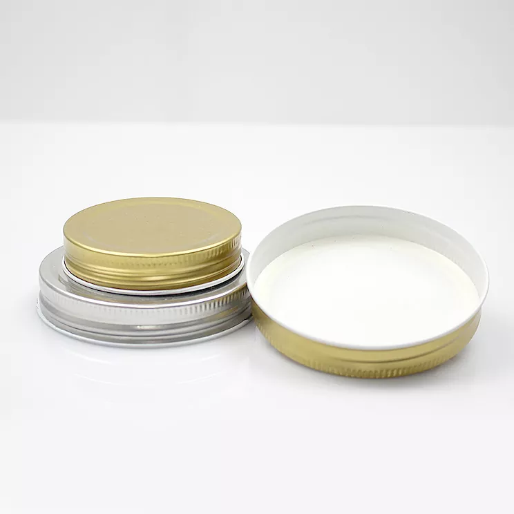 Tapón de rosca multicolor para botella cosmética